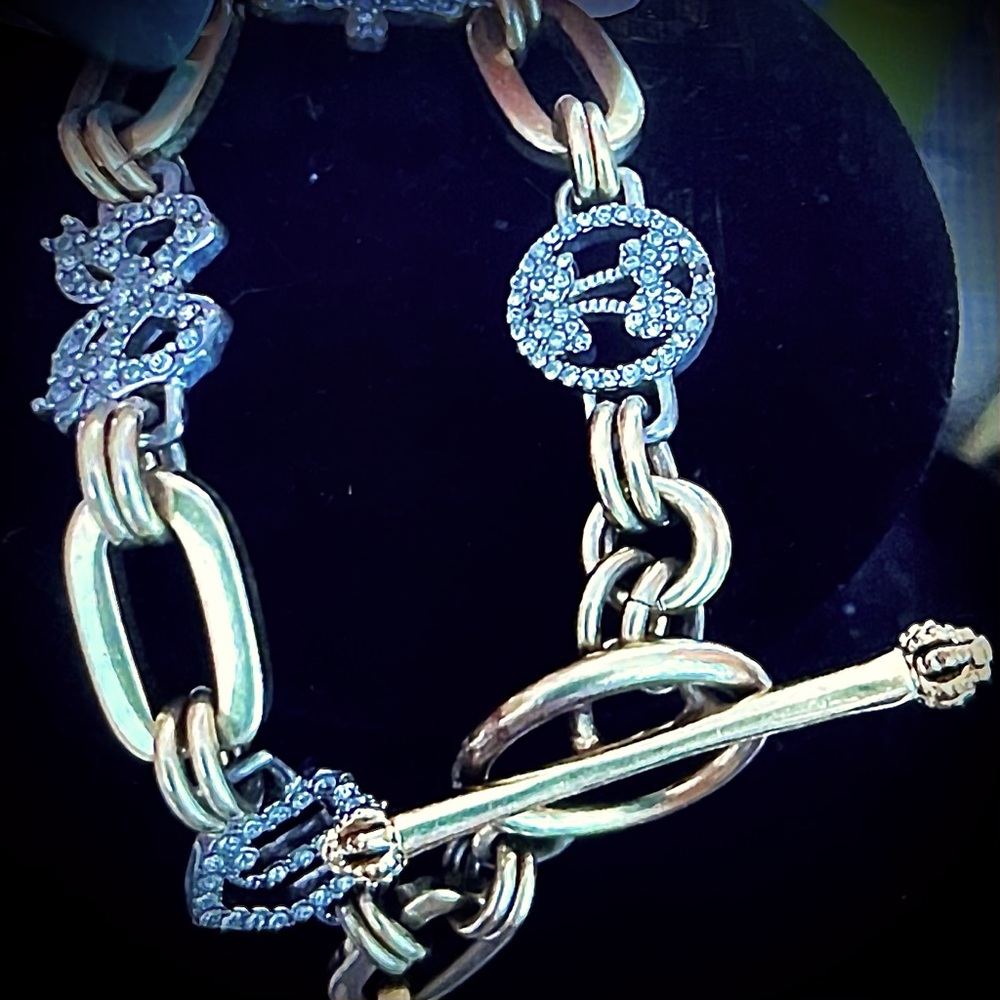 ❤️Juicy Couture charm bracelet gold tone and rhinestone embellishments.